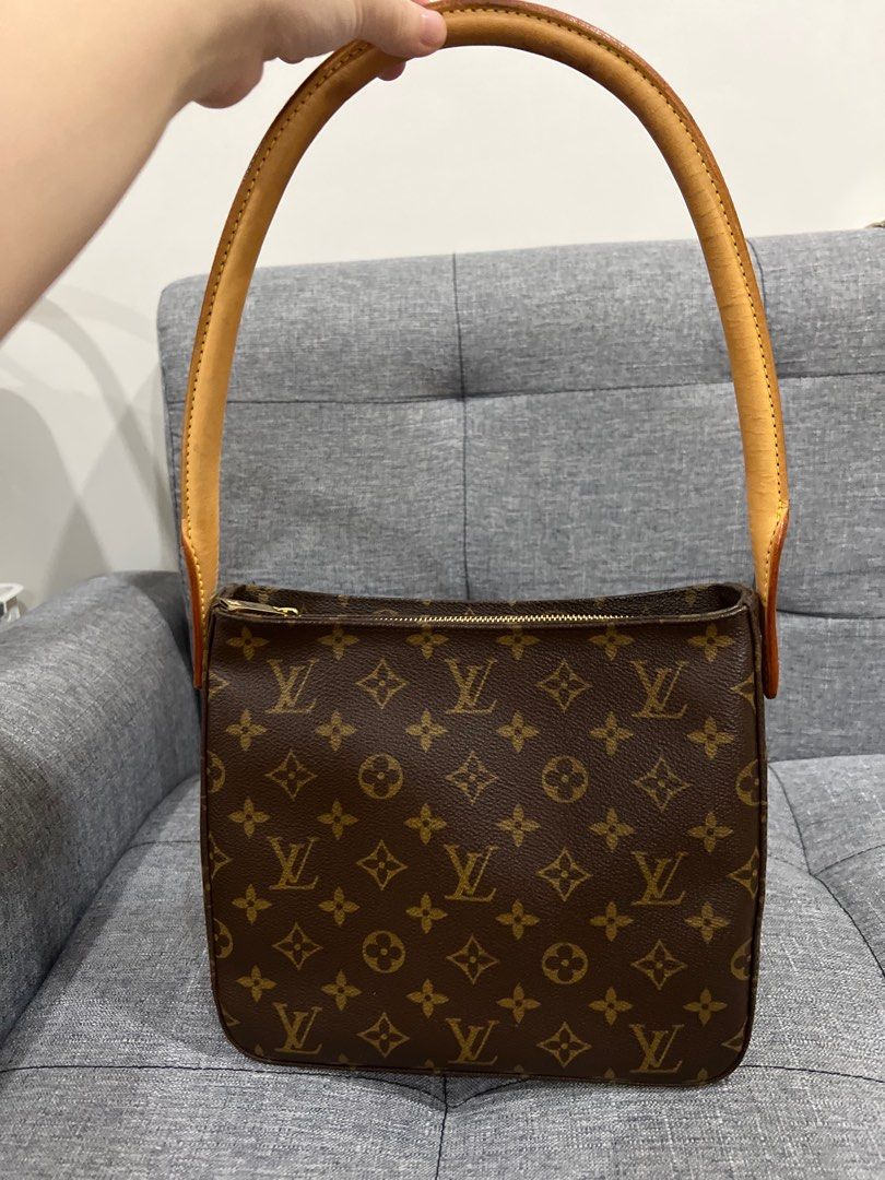 Louis Vuitton Looping MM Monogram bag (Category: Luxury Bags & Wallets) located in Quezon City. Submitted by vickyts43 (Listing ID 1388419182, Image 1). Description: Louis Vuitton Looping MM Monogram bag * Well loved bag. ❗️Only thing to mention❗️ - few discoloration and small cracks/dryness on the vachetta handle (but not noticeable when worn). However, overall it is in good condition. Canvas is still beautiful, insides are clean, and no smell *