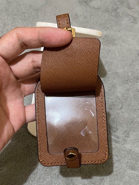 Michale Kors Luggage Tag (Category: Other Accessories) located in Cavite. Submitted by HelloAnn_Closet (Listing ID 1388426734, Image 3). Description: Brandnew luggage tag in saffiano leather, from US no more hangtags and packaging. Selling as is. .