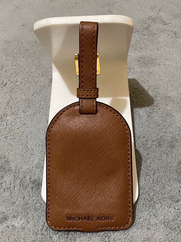 Michale Kors Luggage Tag (Category: Other Accessories) located in Cavite. Submitted by HelloAnn_Closet (Listing ID 1388426734, Image 1). Description: Brandnew luggage tag in saffiano leather, from US no more hangtags and packaging. Selling as is. .