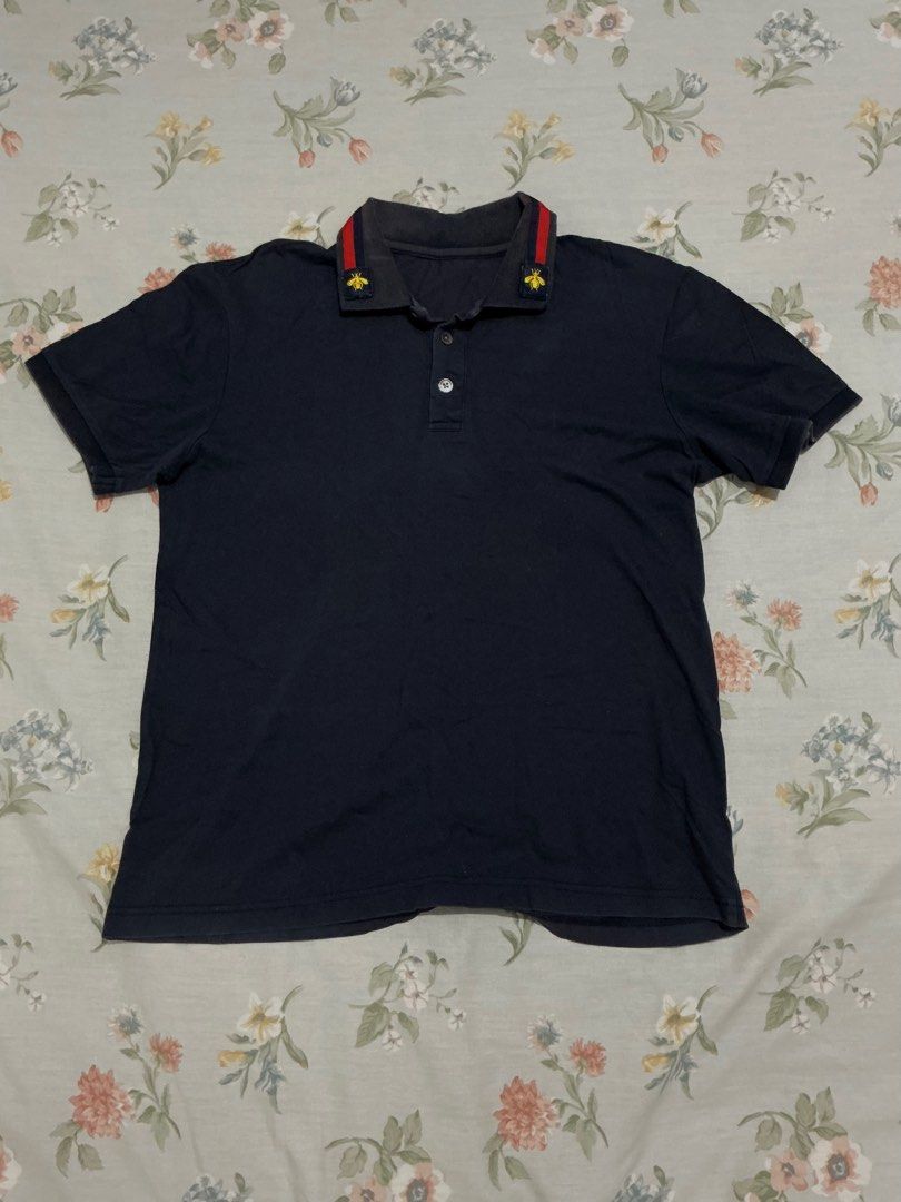Navy blue polo shirt (Category: Tshirts & Polo Shirts ) located in Manila. Submitted by 888declutters (Listing ID 1388493886, Image 1). Description: L: 25 inches W: 19.5 inches No flaws except faded collar.