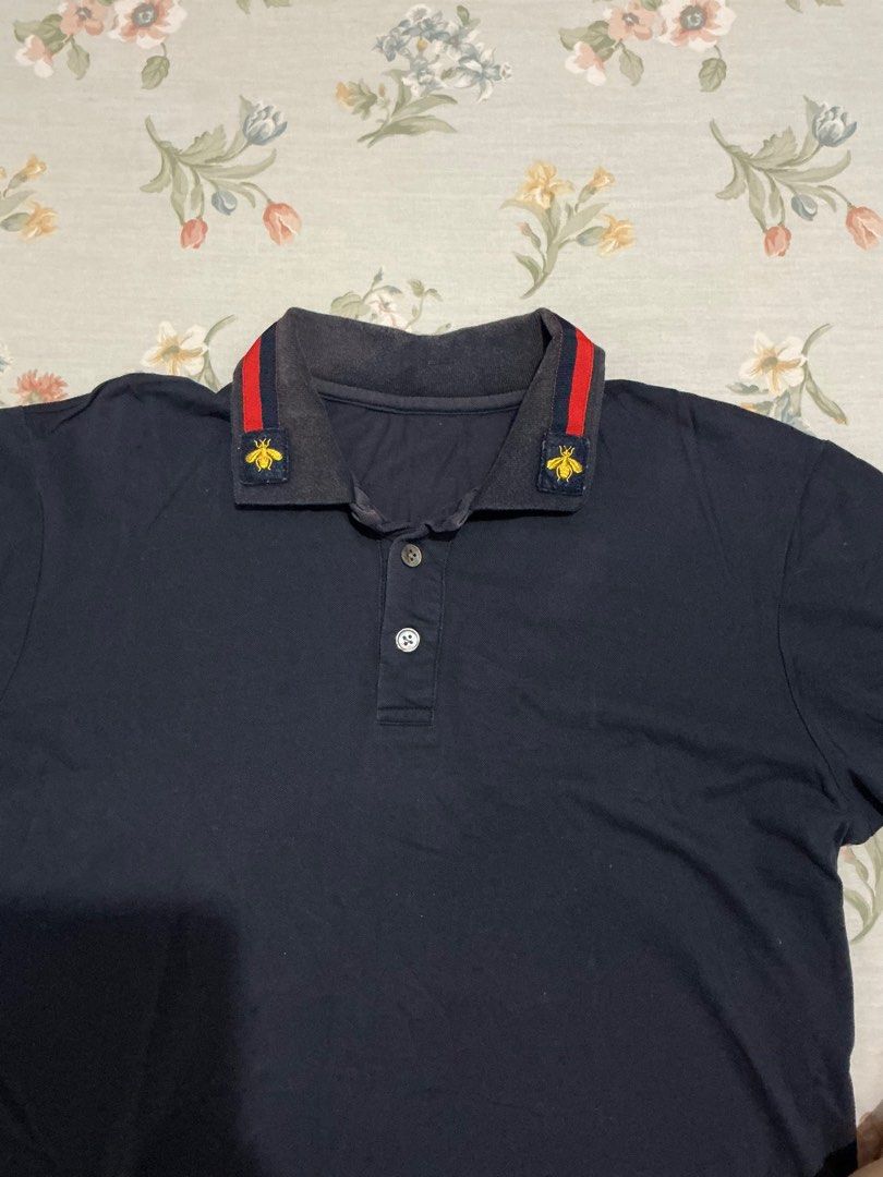 Navy blue polo shirt (Category: Tshirts & Polo Shirts ) located in Manila. Submitted by 888declutters (Listing ID 1388493886, Image 2). Description: L: 25 inches W: 19.5 inches No flaws except faded collar.