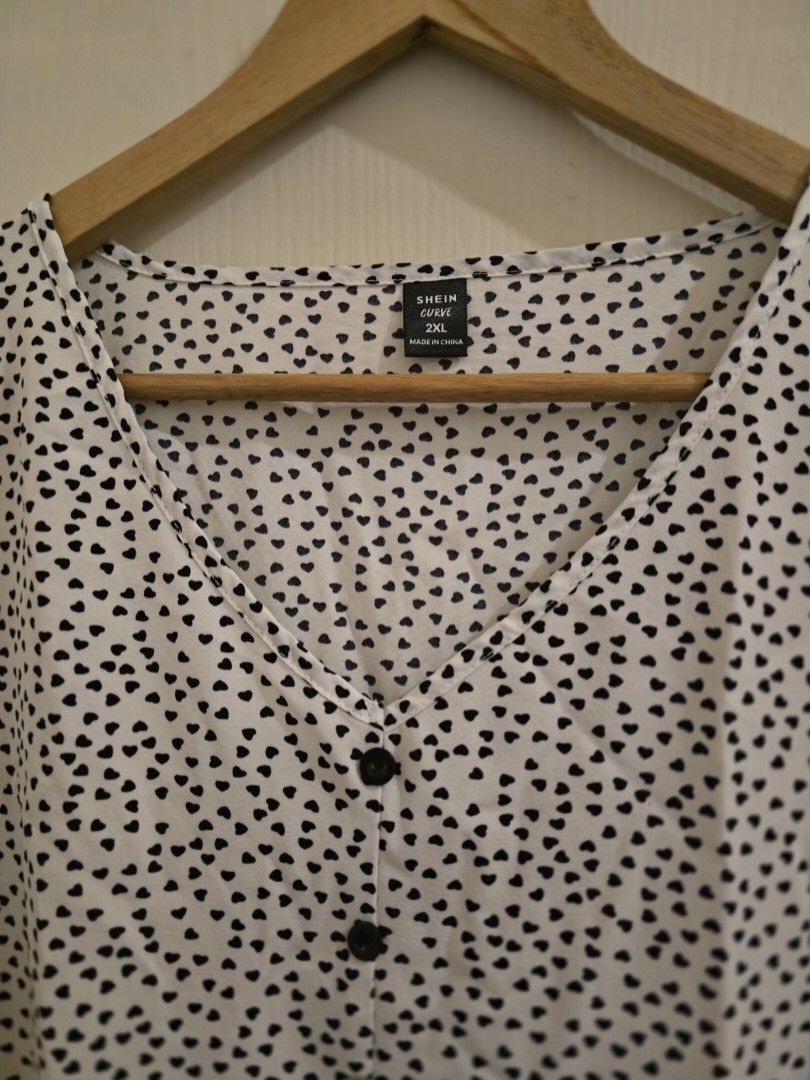 SHEIN Mulvari Plus Allover Heart Button Half Peplum Blouse (Category: Blouses) located in Quezon City. Submitted by ocon_mari (Listing ID 1388413364, Image 2). Description: .