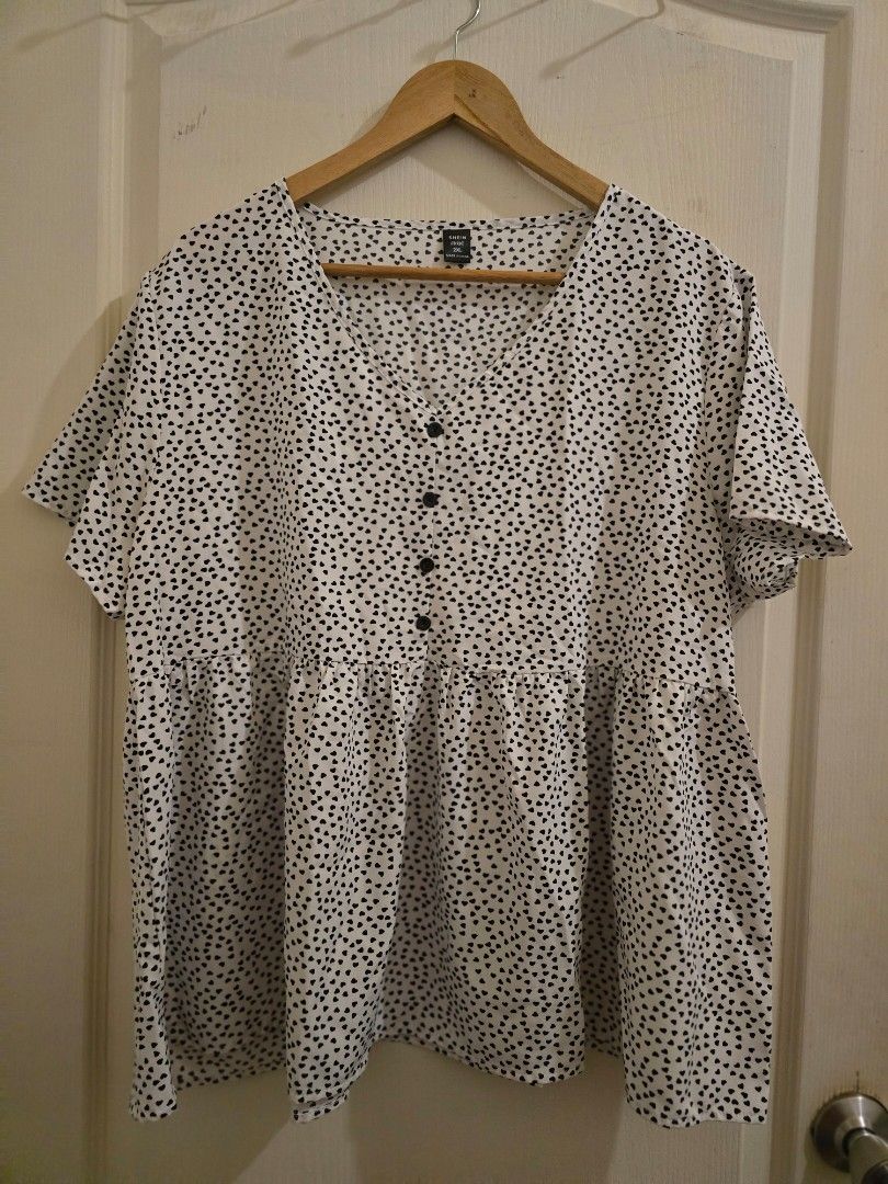 SHEIN Mulvari Plus Allover Heart Button Half Peplum Blouse (Category: Blouses) located in Quezon City. Submitted by ocon_mari (Listing ID 1388413364, Image 1). Description: .