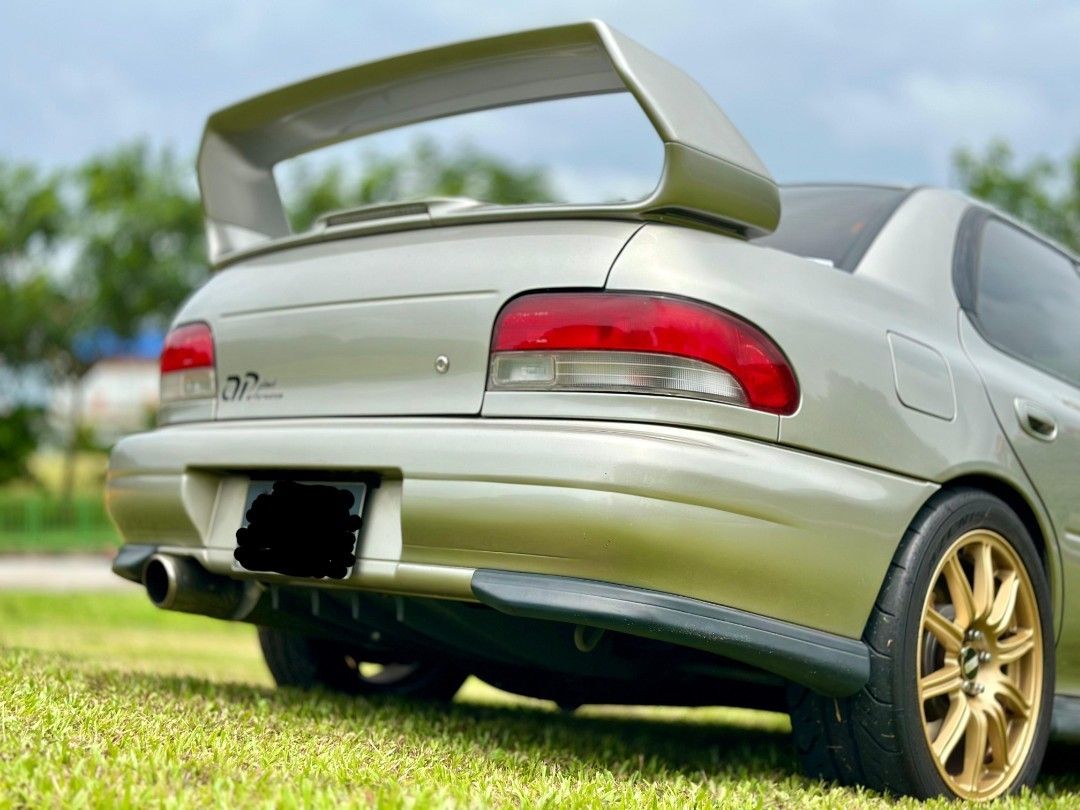 Subaru GC8 Impreza WRX 2.0 Manual Manual (Category: Used Cars) located in Singapore. Submitted by hockyboy (Listing ID 1388369419, Image 3). Description: Ultra Rare Subaru GC8 for sale, Strong EJ20, JDM STI 6 Speed Manual with DCCD. Under carriage - Spec C front arms & S204 rear arms mated with 3 way AST coilover suspension, pillow ball mounts all round for better feel, grip & handling. Gold BBS Rims with matching STI Brembo Gold brake calipers a