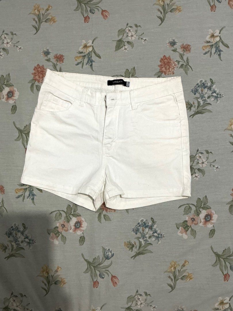 Urban white shorts (Category: Shorts) located in Manila. Submitted by 888declutters (Listing ID 1388494659, Image 1). Description: L on tag but fits medium Waist: 26, 27, 28, 29 helping tags: white jeans short, white trouser.