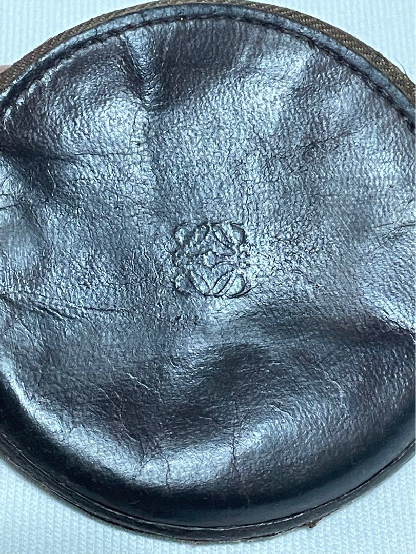 Vintage Loewe Coin Purse (Category: Luxury Bags & Wallets) located in Rosario. Submitted by myvinatgepieces (Listing ID 1388444028, Image 2). Description: Vintage Loewe Coin Purse circa 1990-2000 brown color lambskin signature debossed Anagram motif top zip fastening Good Used Condition With Visible Signs of wear.
