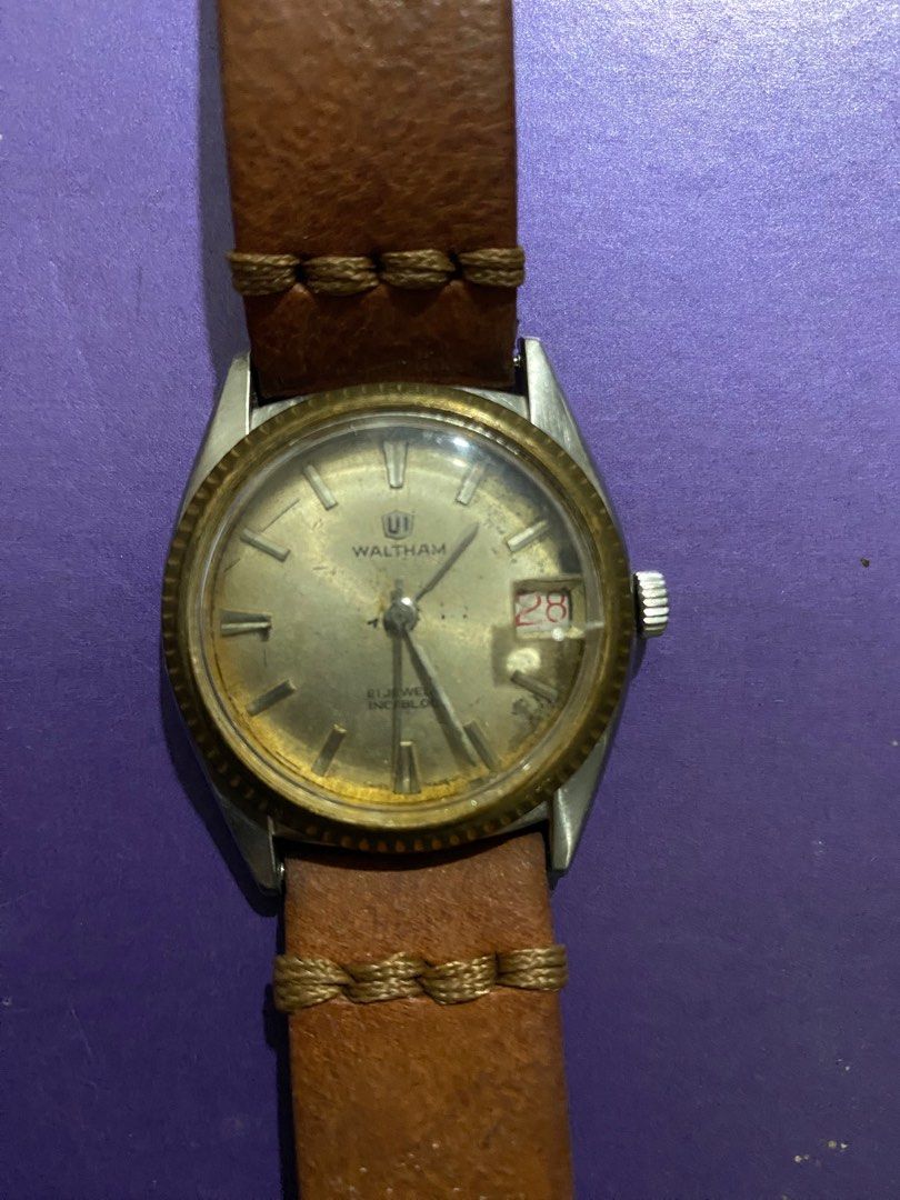 WATCH -WALTHAM all orig ANTIQUE (Category: Men's Watches) located in Makati City. Submitted by celebrityauctions (Listing ID 1388379739, Image 3). Description: The image shows a vintage Waltham wristwatch, specifically a model featuring a date complication and marked with “21 JEWEL INCABLOC” on the dial. Description: Brand and Model: The watch is a Waltham, likely a vintage model from the mid-20th century, possibly a “New Yorker” or similar line,