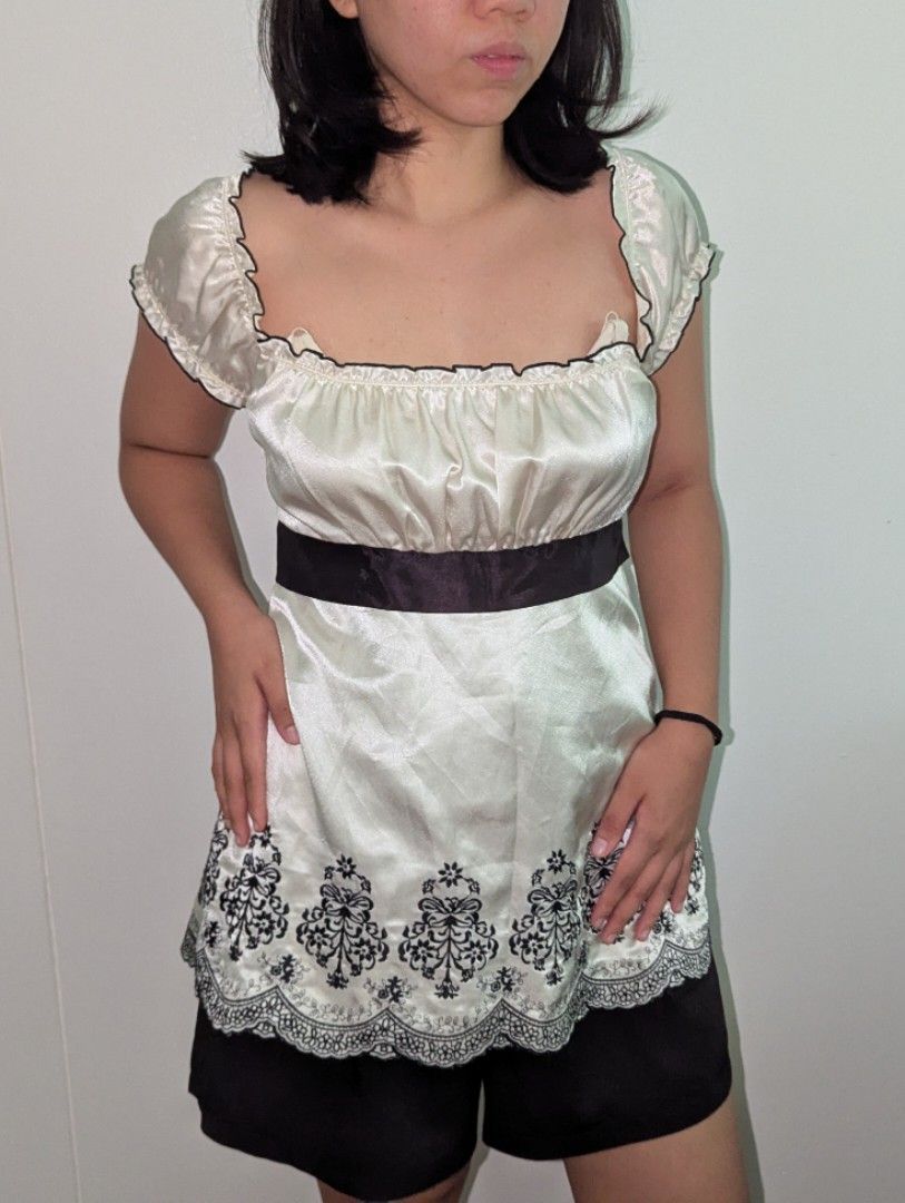 White Silk Babydoll Top (Category: Blouses) located in Los Banos. Submitted by heavens3nt (Listing ID 1388392547, Image 3). Description: - hard to let go - best fits S-M - helpful tags: silk, italian summer, ibiza, coquette, lana del ray.