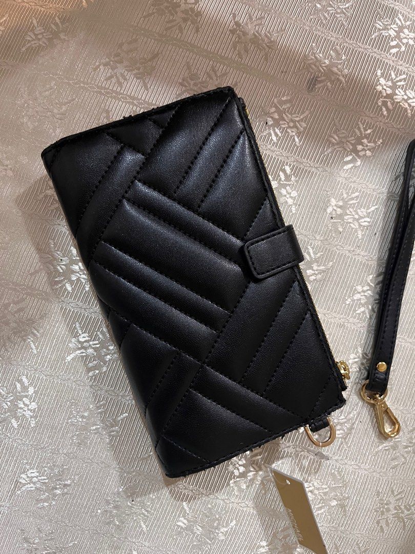 Authentic Michael Kors Peyton Double Zip wristlet (Category: Other Accessories) located in Quezon City. Submitted by psc2nd (Listing ID 1388582366, Image 3). Description: This is an Authentic Michael Kors Peyton Double zip Wristlet quilted Material Black Hardwares are in Gold double zip pockets 1 phone pocket 7 card slot 2 wide multifunctional pockets This i brand new but will flaw. Original was $228… We are selling this aa a very low price becau