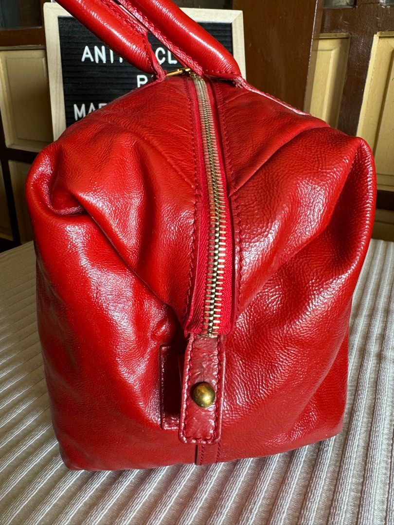 Authentic YSL (Category: Luxury Bags & Wallets) located in Manila. Submitted by chloe_luxuries (Listing ID 1388530461, Image 2). Description: Guaranteed Original YSL Easy small size in color Red Still in good condition with minor sign of used Comes with dustbag Pm for more details.