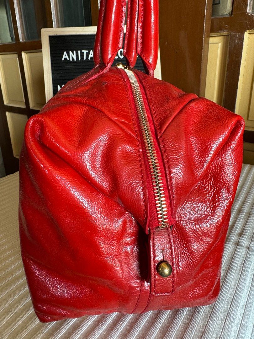 Authentic YSL (Category: Luxury Bags & Wallets) located in Manila. Submitted by chloe_luxuries (Listing ID 1388530461, Image 3). Description: Guaranteed Original YSL Easy small size in color Red Still in good condition with minor sign of used Comes with dustbag Pm for more details.
