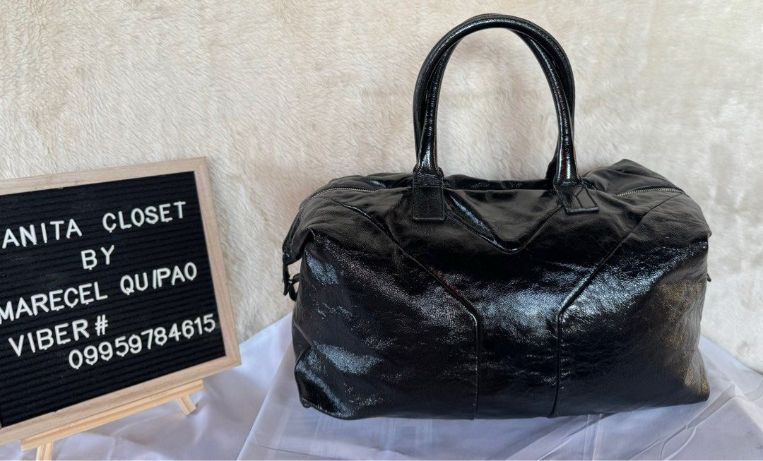 Authentic Ysl (Category: Luxury Bags & Wallets) located in Manila. Submitted by chloe_luxuries (Listing ID 1388531002, Image 1). Description: Guaranteed Original YSL Easy Large aize in color Black Still in very good condition Comes with dustbag Pm for more details.
