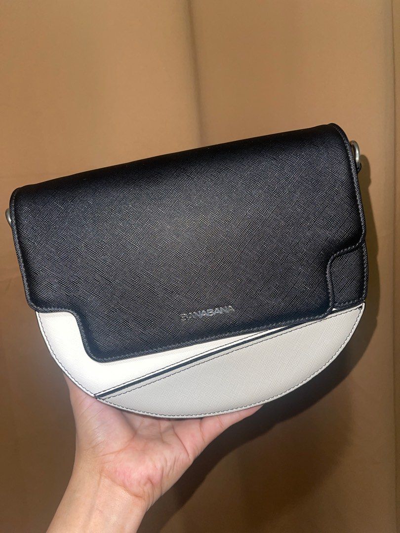 Banabana tri color (Category: Cross-body Bags) located in Manila. Submitted by mjnherthings (Listing ID 1345955899, Image 1). Description: Crossbody bag Tri-colored in silver hardwares Banana leather 🤭 2 compartments 1 zip and 1 open pocket (inside) 6.3 x22 x17 cm Clean inside and out Minimal sign of use.