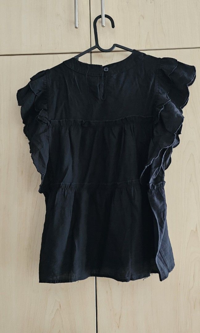 Black ruffle blouse office casual wear (Category: Blouses) located in Makati City. Submitted by joieisdecluttering (Listing ID 1388590968, Image 3). Description: bought online.