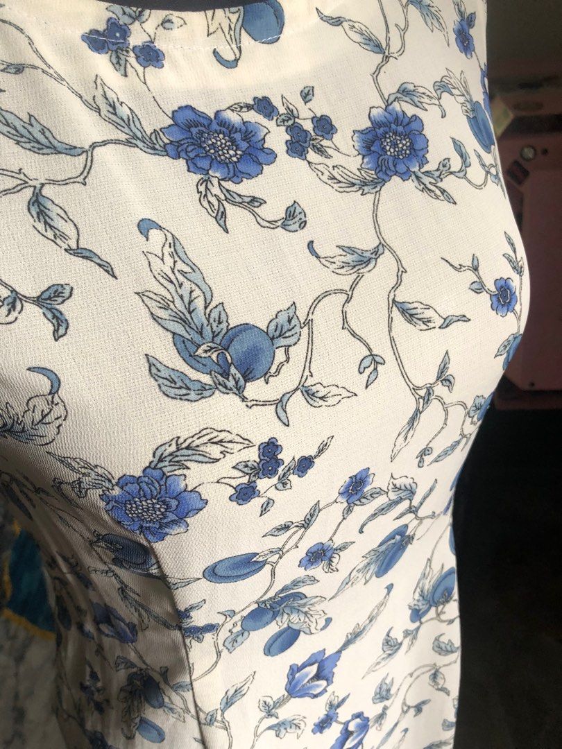 Blue Floral Long Dress (Category: Dresses) located in Calamba. Submitted by ilablue (Listing ID 1388569386, Image 2). Description: Shoulders: 15in Chest:20in Lengh: 45in With side zipper Non stretch Flowy and breathable Can fit s-m.