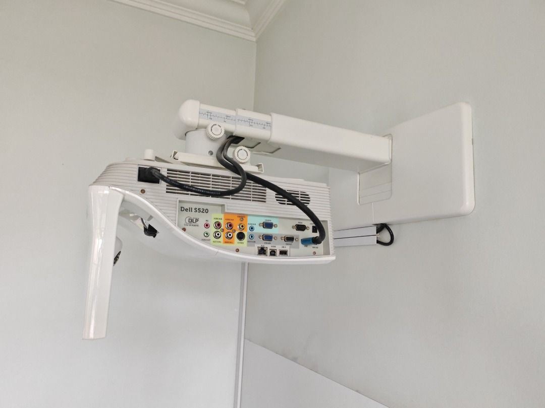 Dell S520 Projector - Used (Category: Projectors) located in Singapore. Submitted by wjuz84 (Listing ID 1388649416, Image 3). Description: - Used Dell SHORT Throw projector - Perfect for home entertainment - Tested and working - Includes power cable - Includes a remote control - Includes wall mount as seen in picture (just this wall mount cost me $200) - Great for movies and gaming I am moving house and I do not have a good place for me to mount 