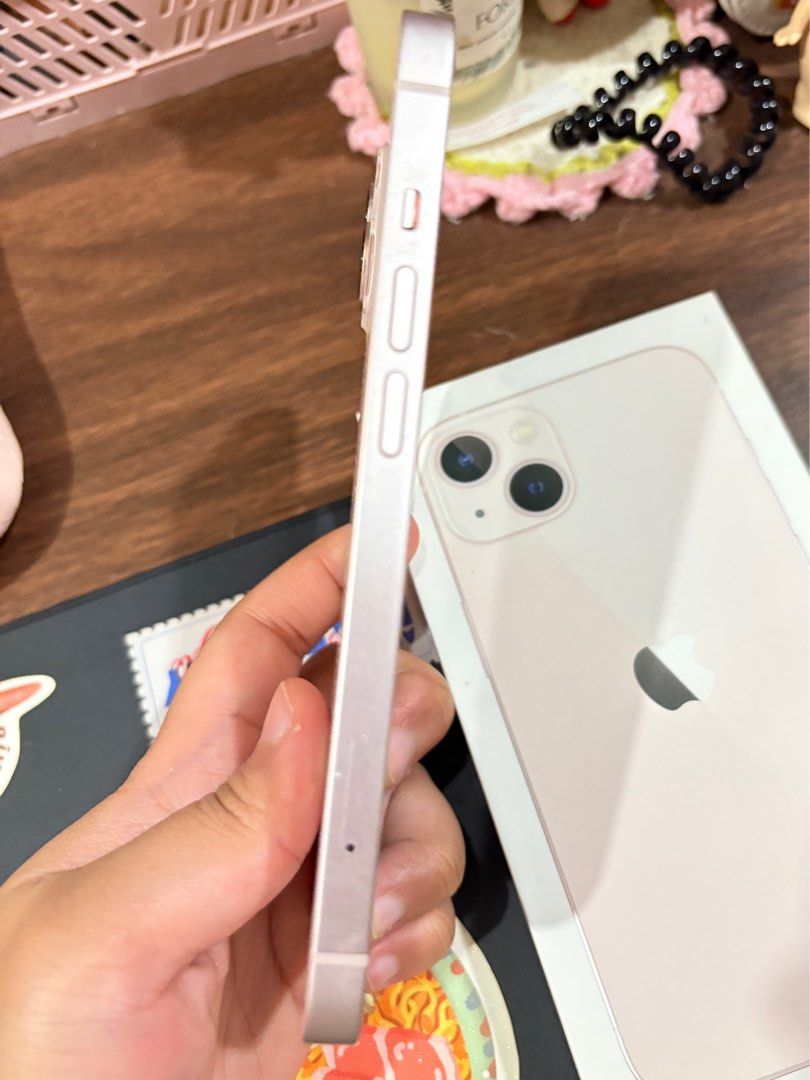 Iphone 13 Pink 128gb (Category: iPhone 13 Series) located in Makati City. Submitted by kyimi_ (Listing ID 1388507381, Image 3). Description: Iphone 13 Pink - 128gb (includes box and original charging cable) Free 3 phone cases No cracks, no dents, no other issues. Still works well. Bought 2022 Battery health service 66% but I can still use it for long hours Delivery only sf shouldered by buyer, NO MEET-UPS as of now Payment: Gcash No haggling .