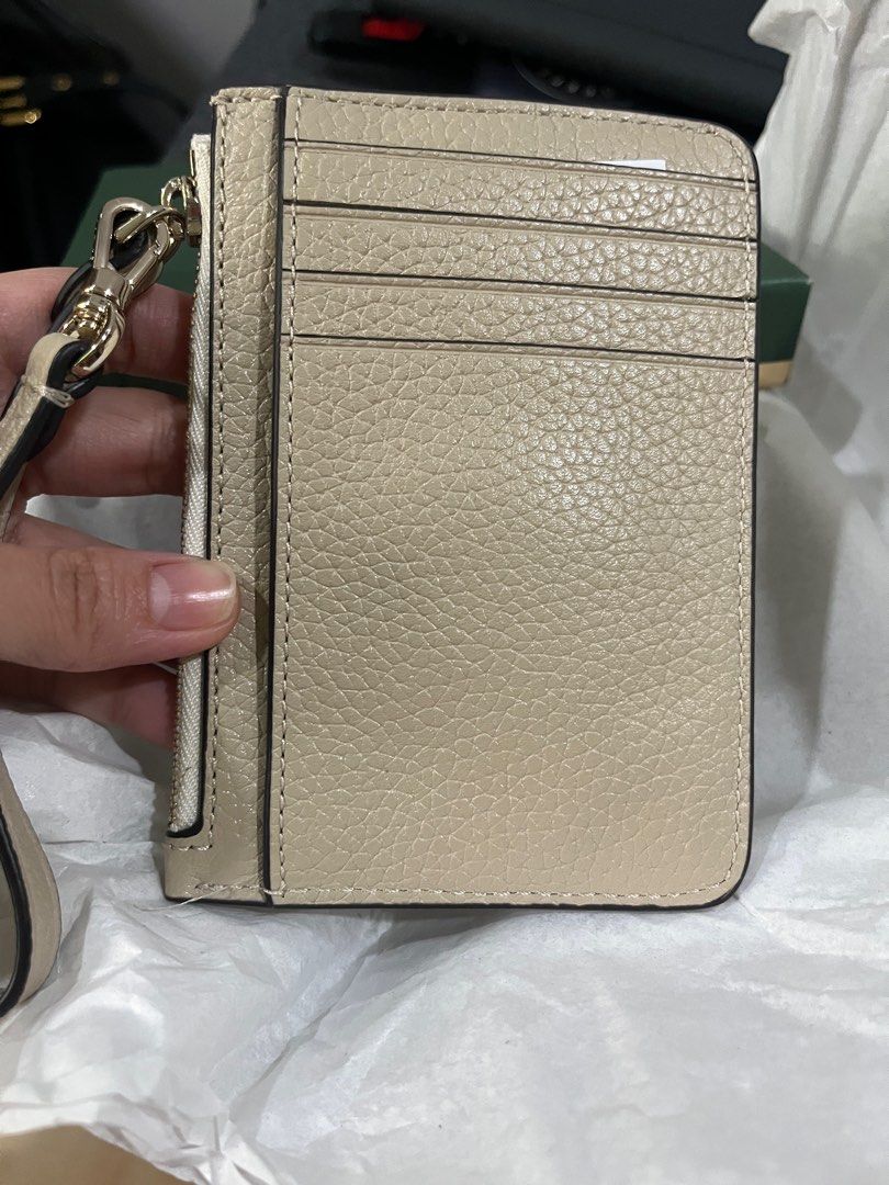 Kate Spade Light Sand Lena Wristlet (Category: Luxury Bags & Wallets) located in Pasig City. Submitted by lasacmar (Listing ID 1388590978, Image 2). Description: Never used Still in original box with tag Bought in the US (outlet store) .