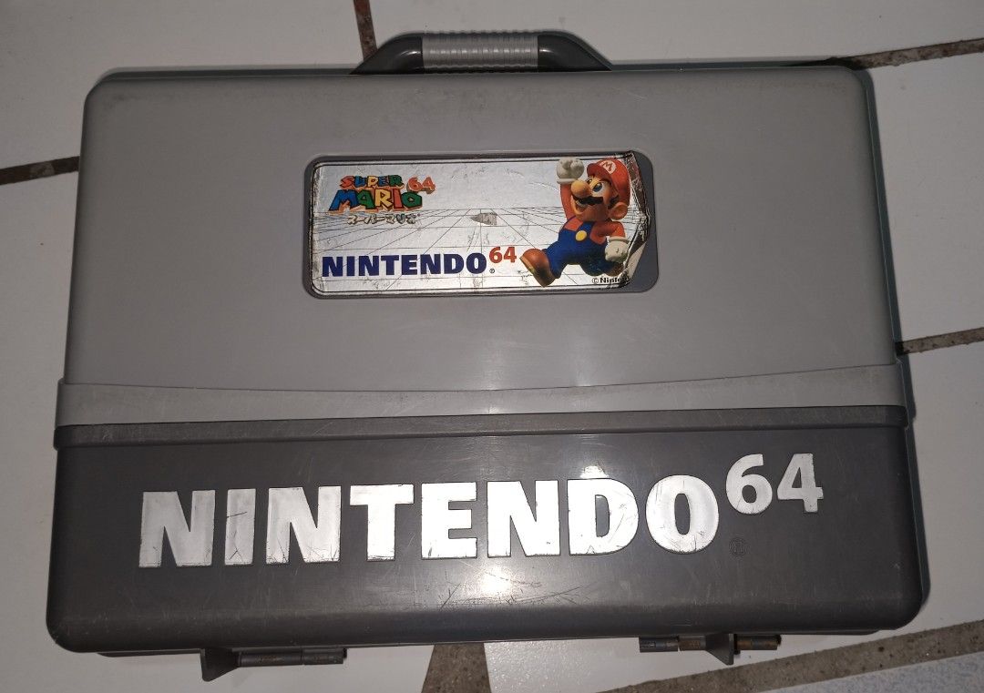 Nintendo 64 Storage Carry Case (Category: Cases & Covers) located in Caloocan City. Submitted by toywarsph (Listing ID 1388540900, Image 1). Description: As is pls see the image for the actual product. *missing clips or lock *damage sticker labels payment via GCash ship via lalamove or flash.