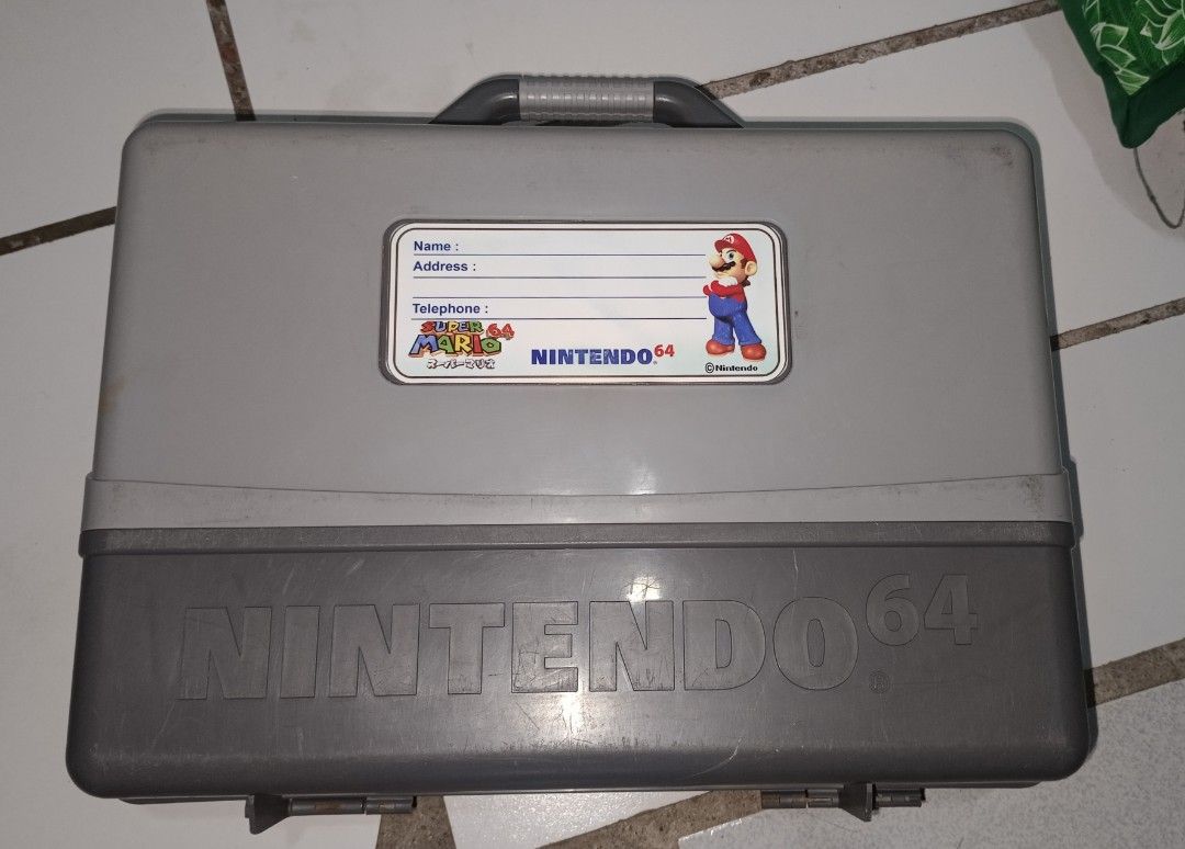 Nintendo 64 Storage Carry Case (Category: Cases & Covers) located in Caloocan City. Submitted by toywarsph (Listing ID 1388540900, Image 2). Description: As is pls see the image for the actual product. *missing clips or lock *damage sticker labels payment via GCash ship via lalamove or flash.