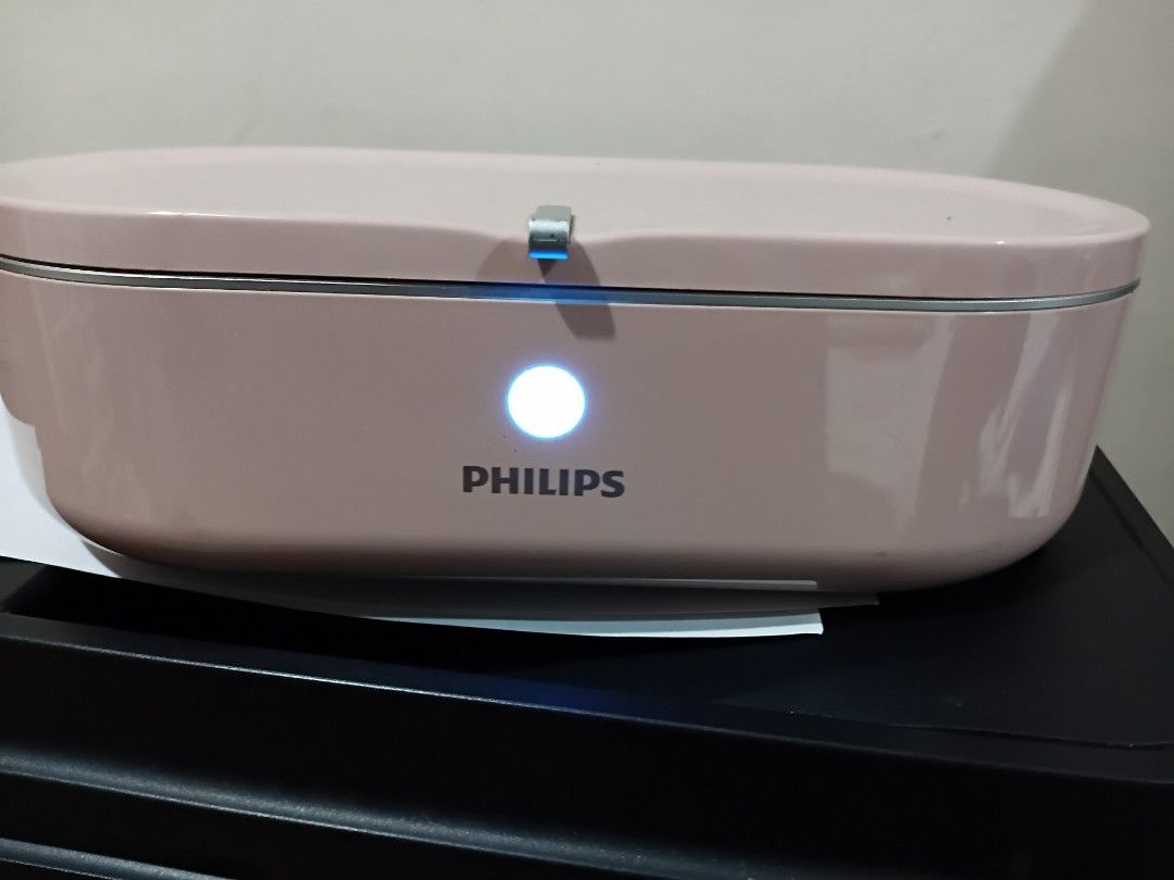 Philips UV-C disinfection mini box (Category: Sanitizers & Disinfectants) located in Quezon City. Submitted by purpleskies0122 (Listing ID 1388612402, Image 1). Description: Used Color: Pink Including charging wire. 700 Location: QC.