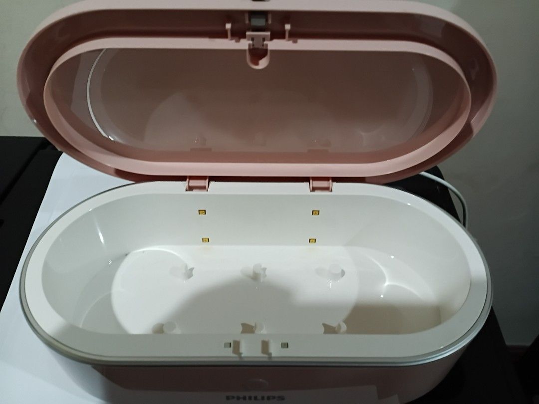 Philips UV-C disinfection mini box (Category: Sanitizers & Disinfectants) located in Quezon City. Submitted by purpleskies0122 (Listing ID 1388612402, Image 2). Description: Used Color: Pink Including charging wire. 700 Location: QC.
