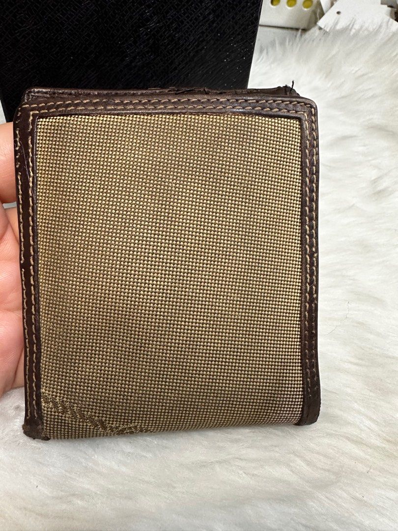 prada men's wallet (Category: Luxury Bags & Wallets) located in Antipolo. Submitted by ambercs (Listing ID 1388522789, Image 2). Description: auth prada mens wallet preloved with minor signs of usage minor rubs can be retouch naman cleaning slightly needed if maselan 2 bill compartment 4-5 card slots 1 coin slot.
