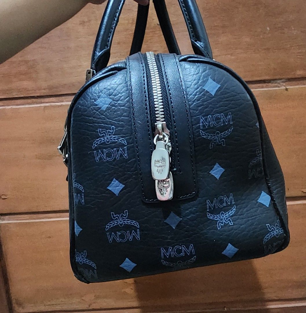 Sale!! Preloved MCM Bag (Category: Luxury Bags & Wallets) located in Pili. Submitted by hannah01. (Listing ID 1388637594, Image 3). Description: -Update: With flaws on edges - Price is still negotiable. - Please message me if you have any inquiries RFS: Decluttering!!.