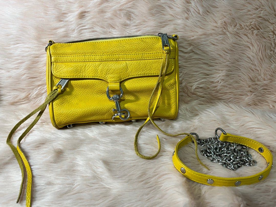 Rebecca Minkoff cross body bag (Category: Cross-body Bags) located in Pasig City. Submitted by jacq0301 (Listing ID 1388554234, Image 1). Description: Rebecca Minkoff yellow cross body bag Heavily used Needs cleaning Hardware still in good condition Perfect for casual events or going to the mall for a pop of color .