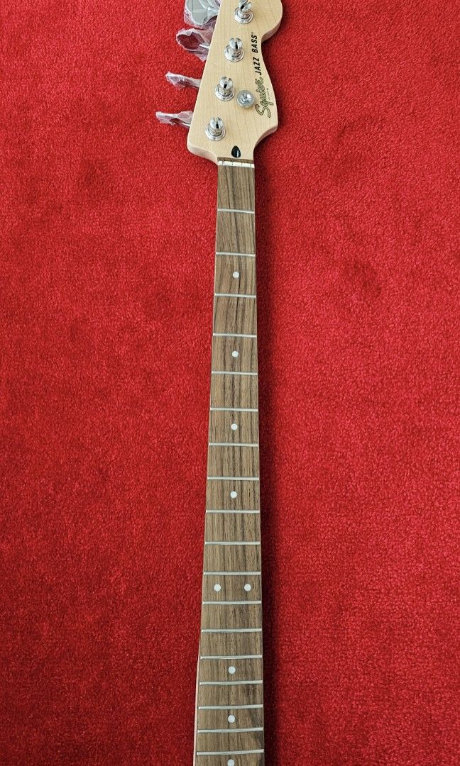 Squier Affinity Jazz Bass Laurel Neck with Tuners (Category: Musical Instruments) located in Manila. Submitted by jdr77 (Listing ID 1388574239, Image 2). Description: Selling this Squier Affinity Jazz Bass Laurel Neck with Tuners. Neck with Tuners only. Removed the neck from the body when it was still new. Location: BGC Area Pickup at my office near Serendra/SM Aura.