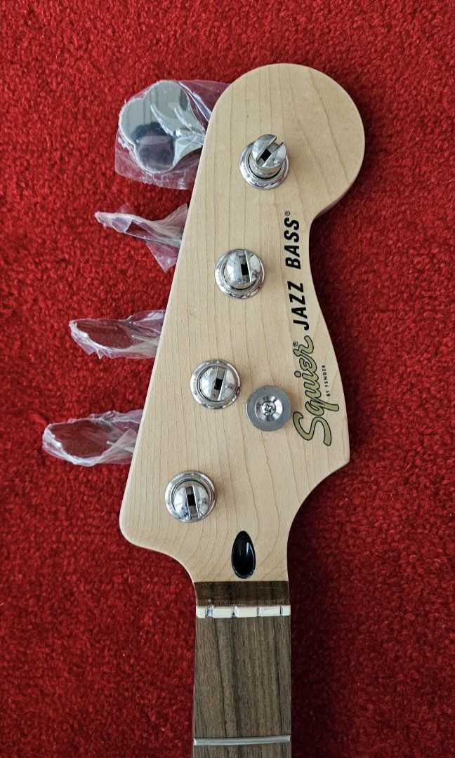 Squier Affinity Jazz Bass Laurel Neck with Tuners (Category: Musical Instruments) located in Manila. Submitted by jdr77 (Listing ID 1388574239, Image 1). Description: Selling this Squier Affinity Jazz Bass Laurel Neck with Tuners. Neck with Tuners only. Removed the neck from the body when it was still new. Location: BGC Area Pickup at my office near Serendra/SM Aura.
