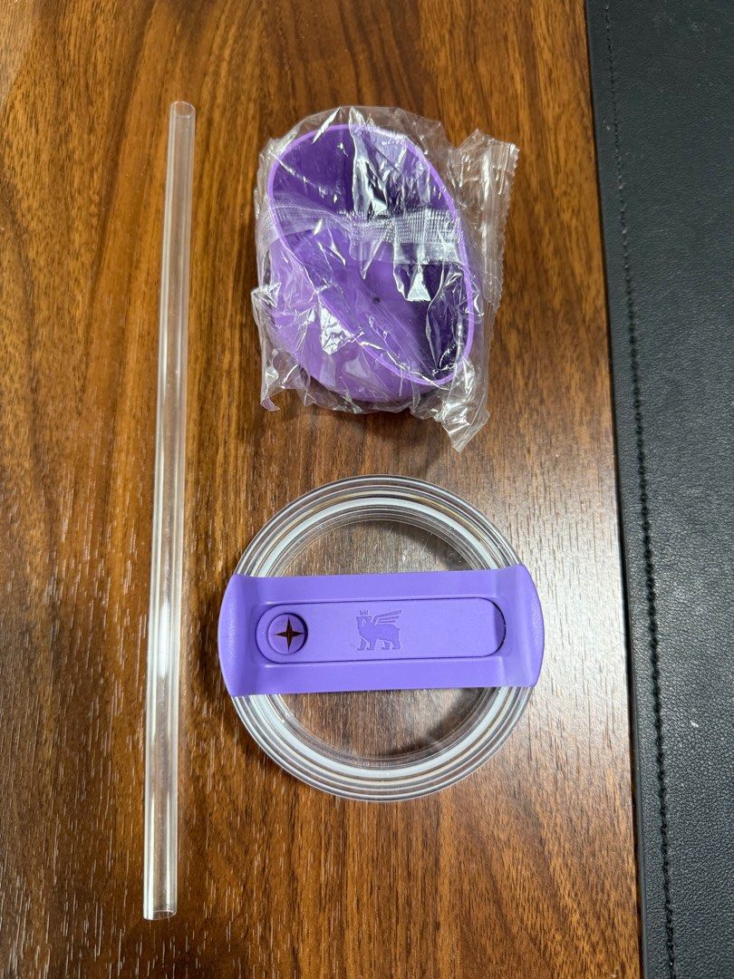 Stanley Tumbler Lid, Straw, and Splash Guard - Purple (Category: Water Bottles & Tumblers) located in Singapore. Submitted by rylandstuffz (Listing ID 1388654633, Image 1). Description: - Brand new Stanley tumbler accessories. - Includes: - Purple lid (30 oz) - Clear straw - Splash guard - Features the Stanley logo on the lid. - Ideal for replacing lost/damaged parts or a new tumbler setup. - Never been used .