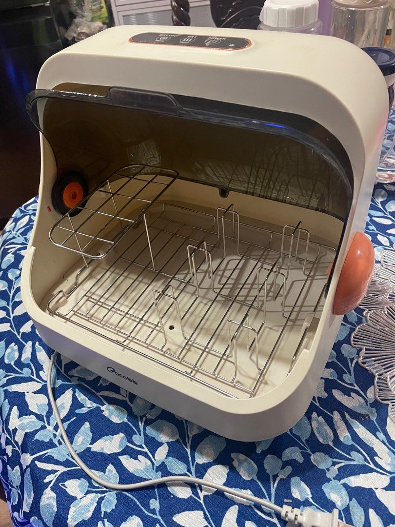 Sterilizer & Dryer— Cocobb Auto-off UV Sterilizer & Dryer (Category: Breastfeeding & Bottle Feeding) located in Quezon City. Submitted by klydfortz (Listing ID 1388553606, Image 2). Description: Used only for 6 months In very good condition, no issue. RFS: Upgraded to bigger sterilizer Note: Location: Sauyo, Quezon City Shipping fee care of buyer Payment first basis.