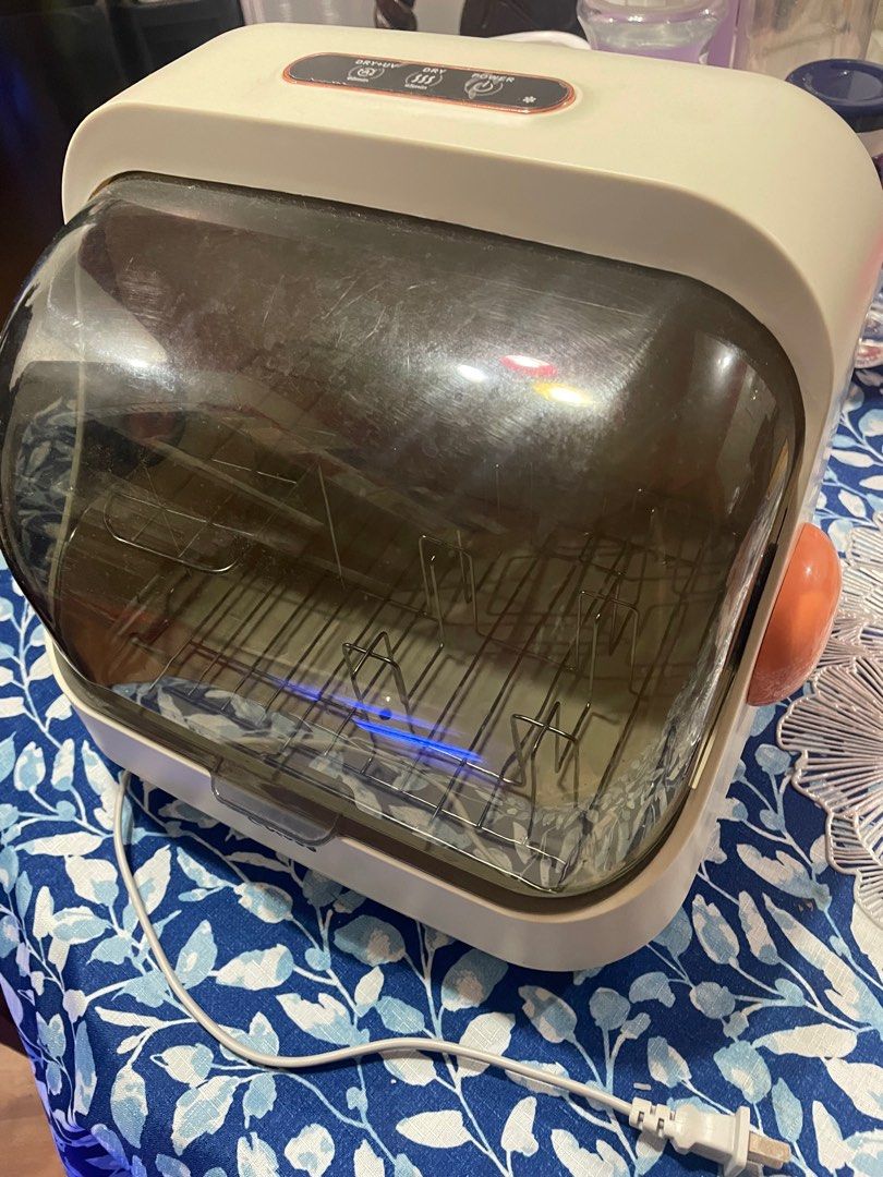 Sterilizer & Dryer— Cocobb Auto-off UV Sterilizer & Dryer (Category: Breastfeeding & Bottle Feeding) located in Quezon City. Submitted by klydfortz (Listing ID 1388553606, Image 3). Description: Used only for 6 months In very good condition, no issue. RFS: Upgraded to bigger sterilizer Note: Location: Sauyo, Quezon City Shipping fee care of buyer Payment first basis.