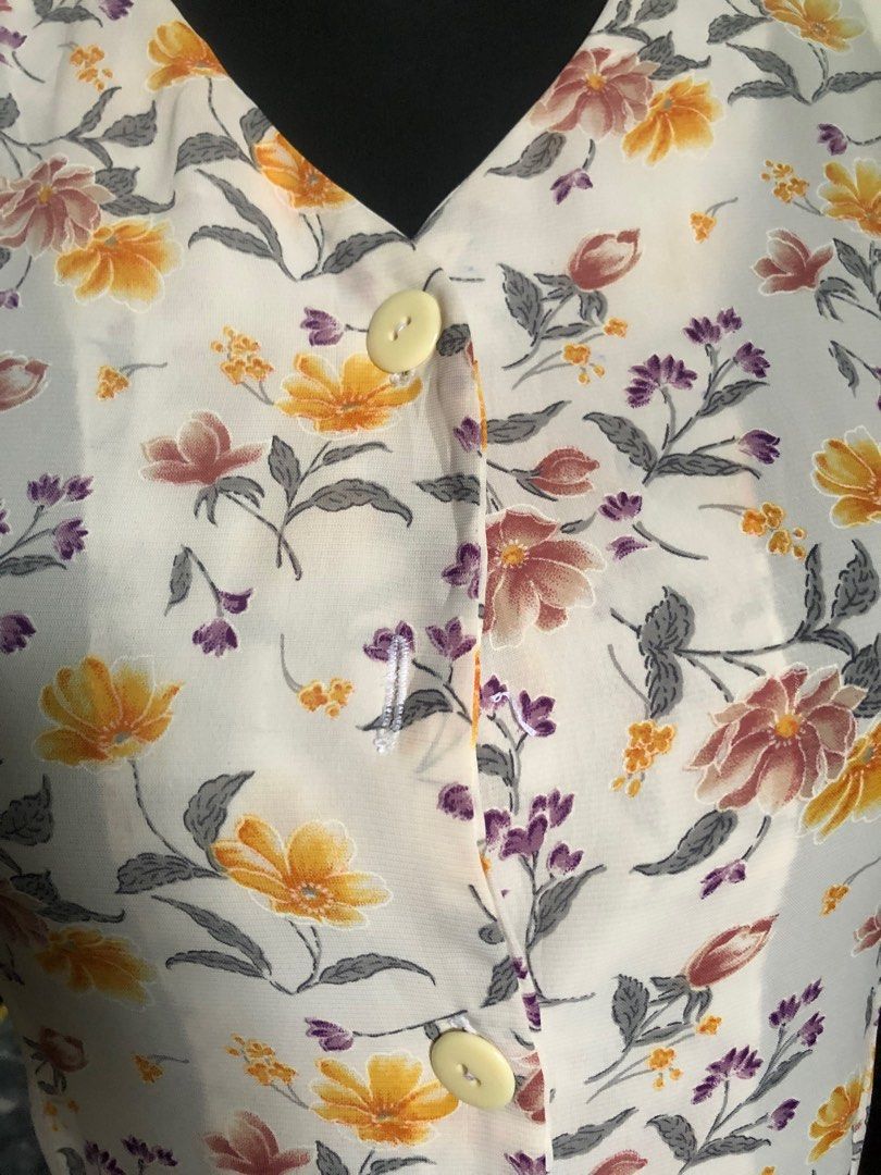 White Floral Dress (Category: Dresses) located in Calamba. Submitted by ilablue (Listing ID 1388572114, Image 3). Description: Shouler:13in Chest: 18in Length: 40.5in With belt at the back Should use nude colored undies Functional buttons Can fit s-m.