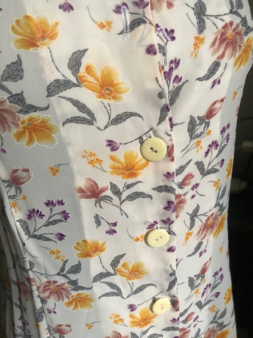 White Floral Dress (Category: Dresses) located in Calamba. Submitted by ilablue (Listing ID 1388572114, Image 2). Description: Shouler:13in Chest: 18in Length: 40.5in With belt at the back Should use nude colored undies Functional buttons Can fit s-m.