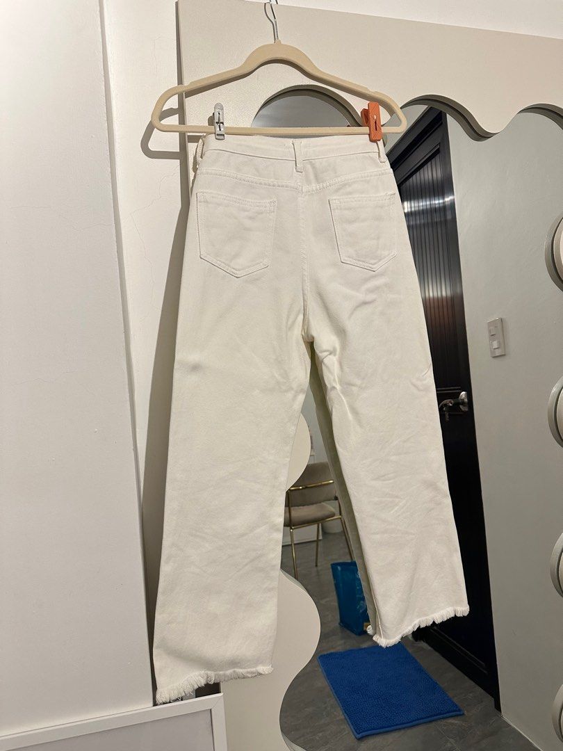 White highwaist pants (Category: Jeans) located in Marilao. Submitted by pgbdc (Listing ID 1388628296, Image 3). Description: - white highwaist pants - very hard denim and good condition - waist: 26in length: 35in - from underground designer.