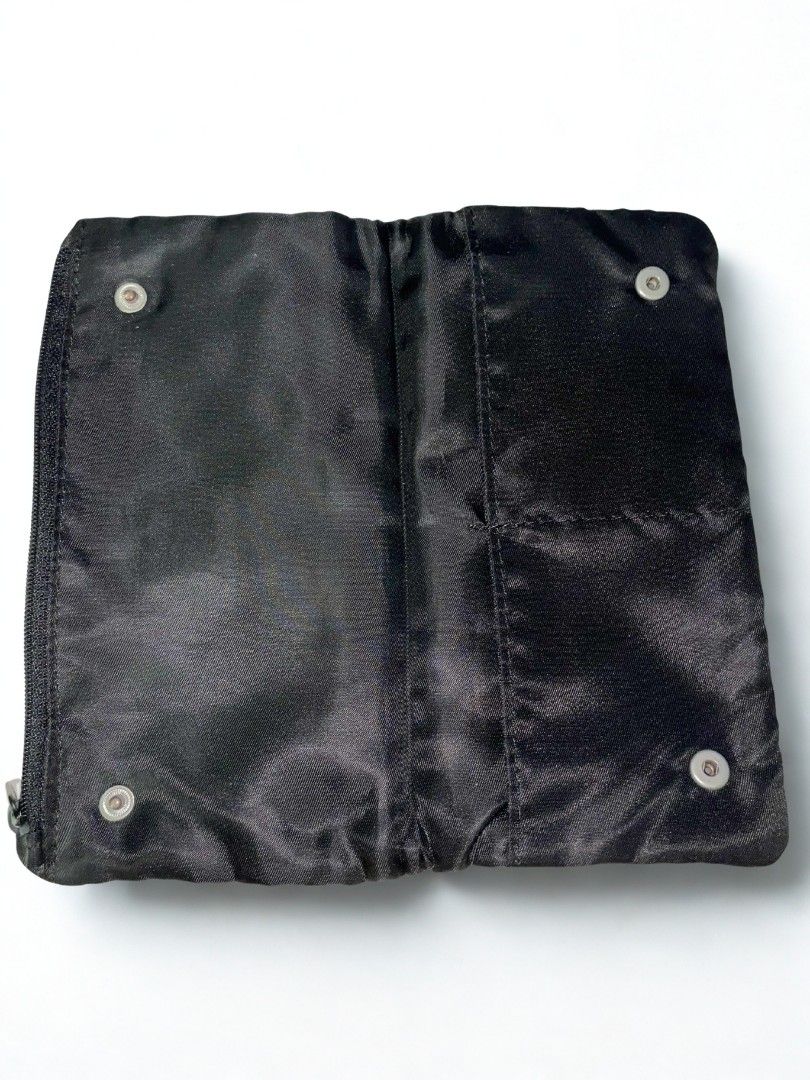 2 Nylon Wallets (Mini and Long wallet) (Category: Purses & Pouches) located in Makati City. Submitted by micmic804 (Listing ID 1388766626, Image 3). Description: 2 pcs of Nylon Wallets. One mini zip around and 1 Long dual zipper wallet..