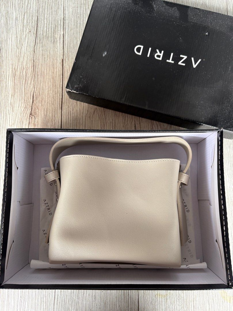 Aztrid Small Bag Crossbody Top Handle (Category: Cross-body Bags) located in Santa Rosa. Submitted by bluemingbh (Listing ID 1388727728, Image 2). Description: • brand new / never been used • color: bone • size: small • authentic mop: gcash, bdo, maya mod: lalamove or grab from sta rosa laguna or makati .