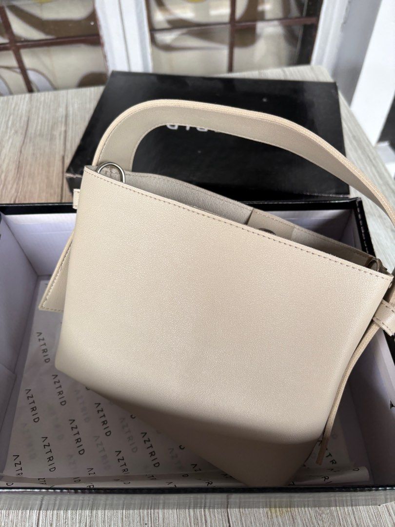 Aztrid Small Bag Crossbody Top Handle (Category: Cross-body Bags) located in Santa Rosa. Submitted by bluemingbh (Listing ID 1388727728, Image 3). Description: • brand new / never been used • color: bone • size: small • authentic mop: gcash, bdo, maya mod: lalamove or grab from sta rosa laguna or makati .