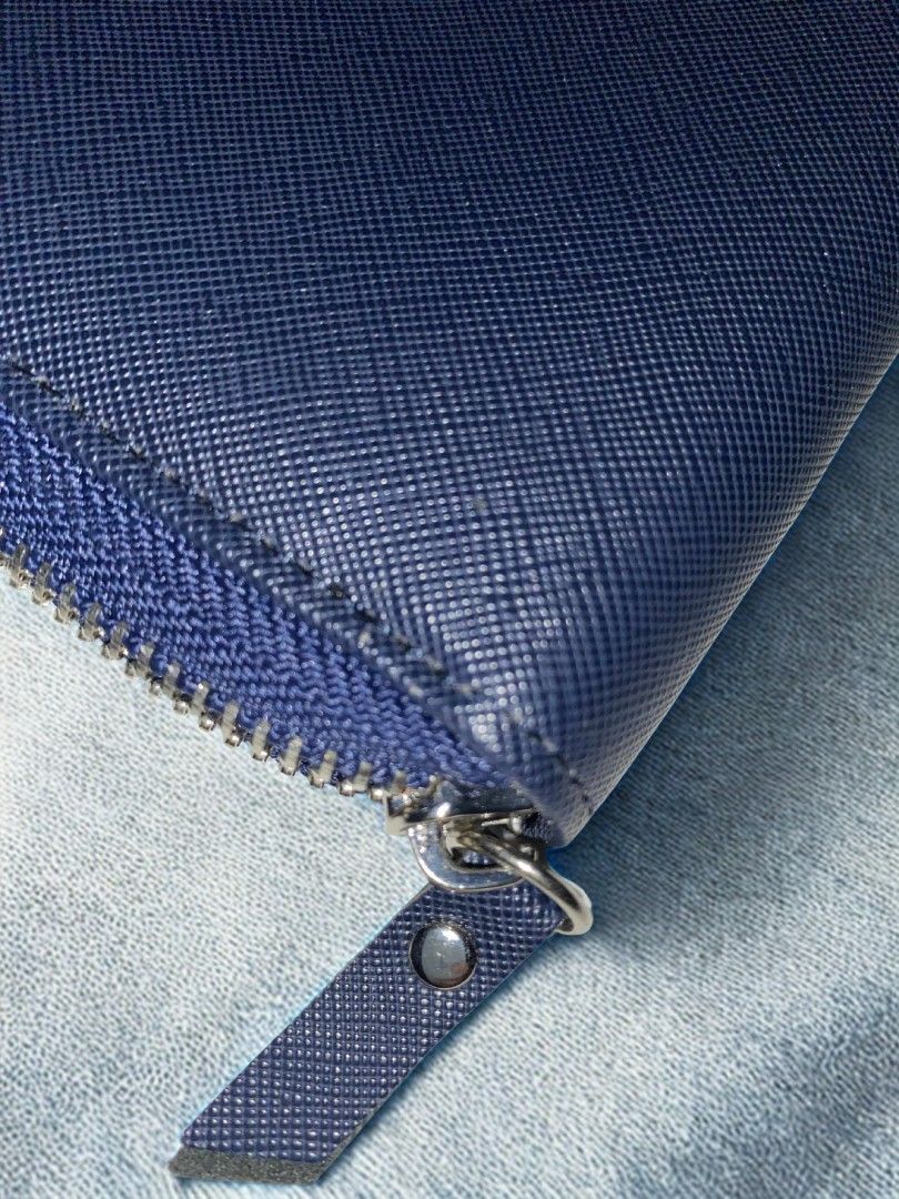 Blue Long zip Around Wallet from Miniso (Category: Purses & Pouches) located in Makati City. Submitted by micmic804 (Listing ID 1388772633, Image 3). Description: Long zip around wallet from Miniso. used only a few times..