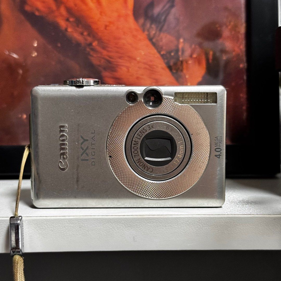Canon Ixy Digital 50 (Category: Cameras) located in Cebu City. Submitted by gilejehhk (Listing ID 1388725354, Image 1). Description: SILVER: Canon Ixy Digital 50 fully functional (issue: lcd burn; doesn’t affect the output) -5 megapixel Unit, battery and universal clip charger only!.