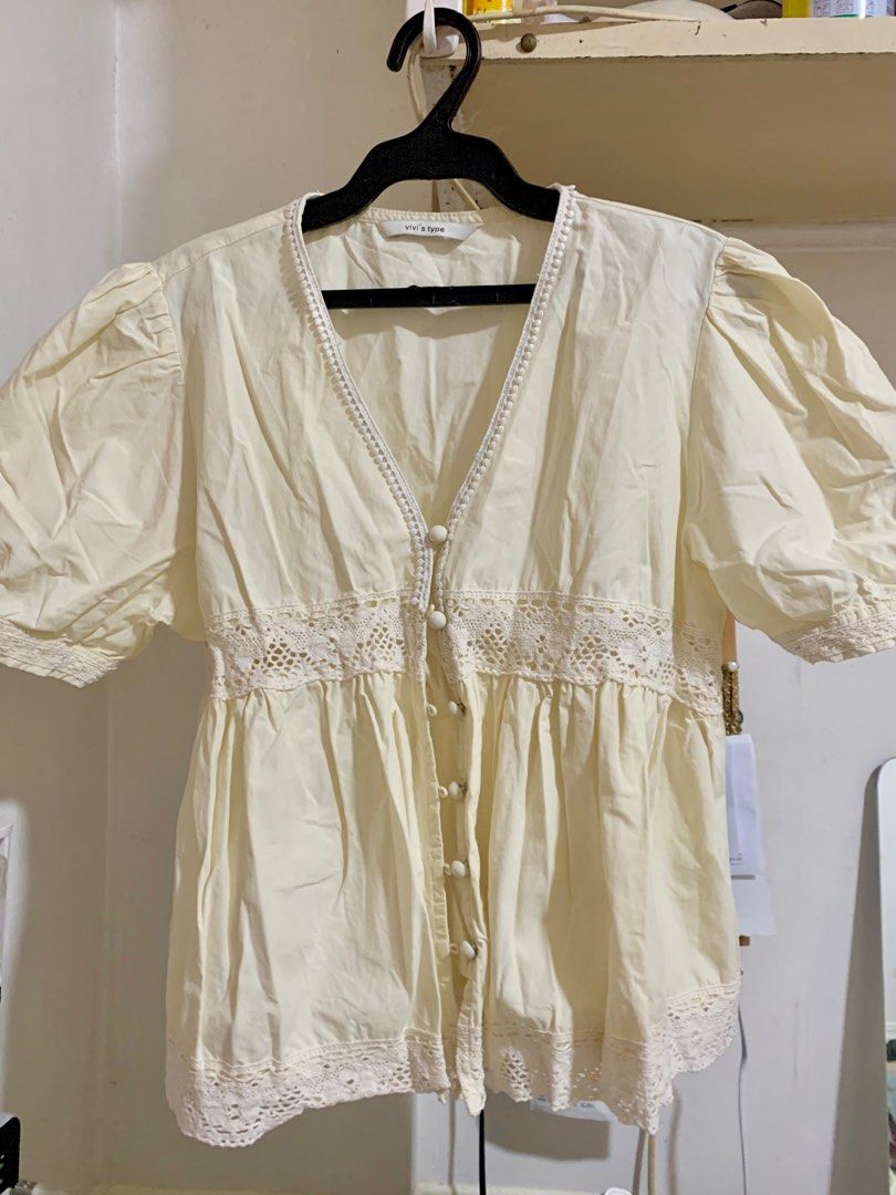 Cream baby doll top (Category: Blouses) located in Manila. Submitted by jessdzn (Listing ID 1388748008, Image 1). Description: Super cute, almost new. Just don’t fit anymore after I gave birth. Size is small to medium.