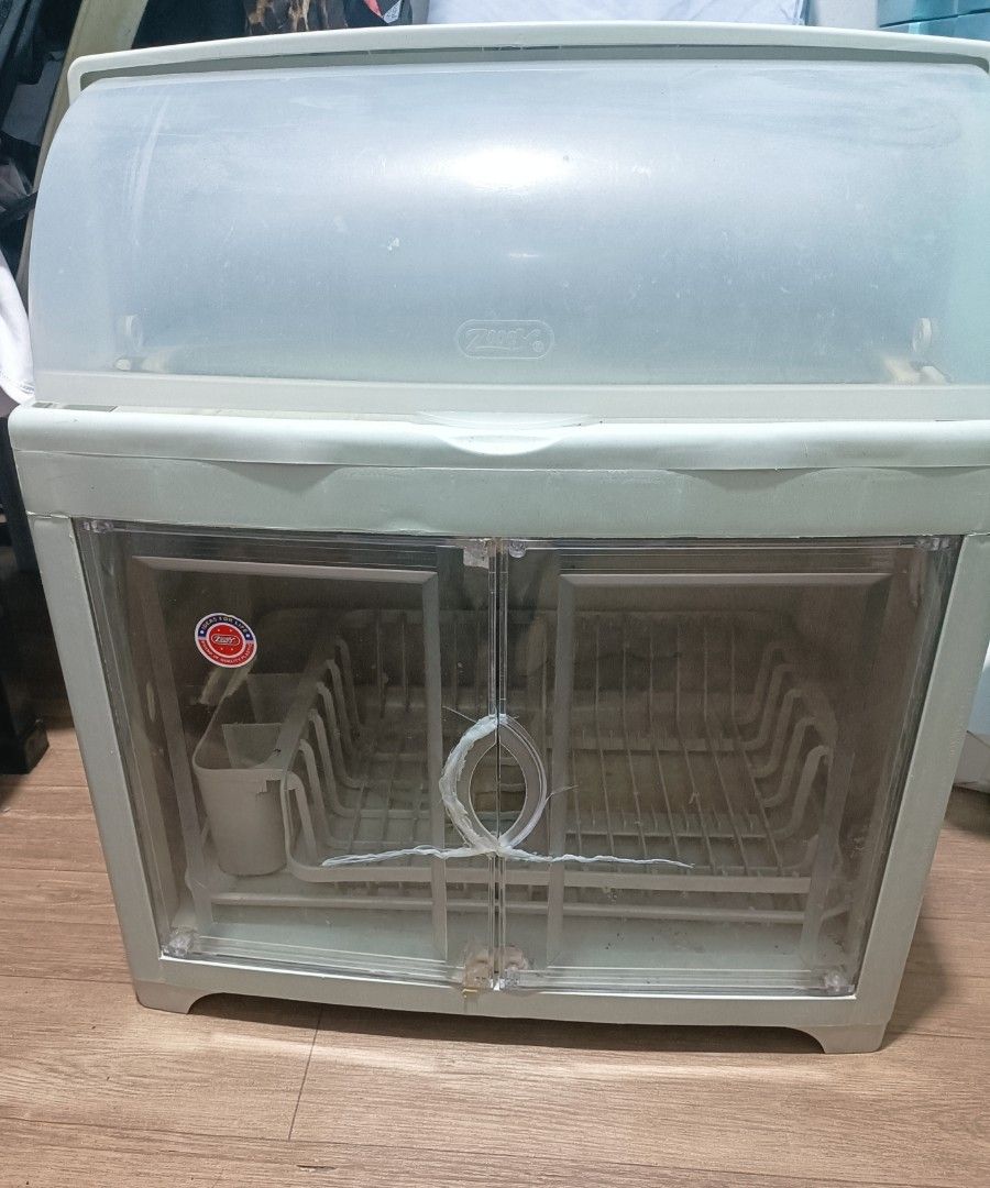 Dish Cabinet (Category: Storage Boxes & Baskets) located in Mandaluyong City. Submitted by dovelyn06 (Listing ID 1388804781, Image 1). Description: used but not abused still works its purpose w/ free rice container 20L.