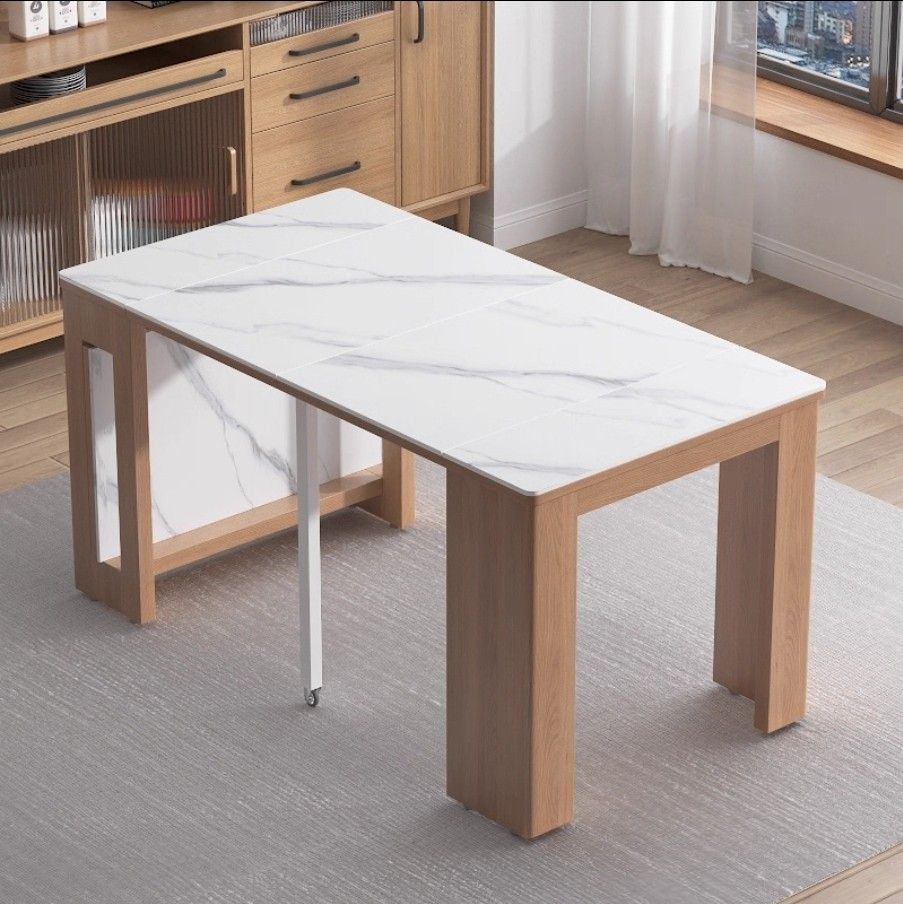 Extendable Dining Table with Stools (Category: Tables & Sets) located in Singapore. Submitted by w52weddings (Listing ID 1388745102, Image 3). Description: - Compact dining table ideal for small spaces. - Foldable for easy storage. - Extendable to fit more guests. - Comes with two stools (store under table). - Note: Small crack on the tabletop. $200 cash & carry * small crack at one of the table.