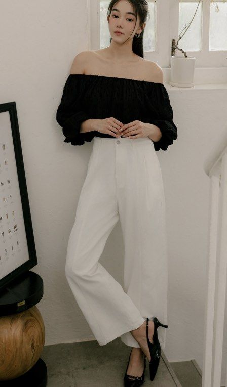 Fashmob Aubree Tencel Top - Black (Category: Blouses) located in Singapore. Submitted by tatertotsx (Listing ID 1388906010, Image 2). Description: - Off-shoulder design - Swiss dotted embroidered details - Pleated, textured fabric - Babydoll flare cut - Puffed sleeves with elastic bubble hems - Fully lined - Can be worn on or off the shoulder.