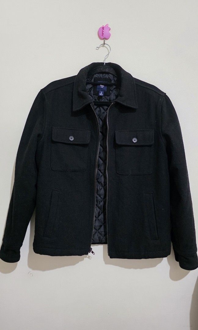 Gap Mens Jacket Wool black (Category: Coats, Jackets and Outerwear) located in Mabalacat. Submitted by enoscep (Listing ID 1388750520, Image 1). Description: Gap Mens Jacket Wool Outer material With quilted inner lining 4 pockets (2 with button) W:20" L:25" Sleeve Length:24" ☆rfs: decluttering ☆mop: bpi, bdo, gcash ☆mod: j&t ☆no return, refund, or exchange.