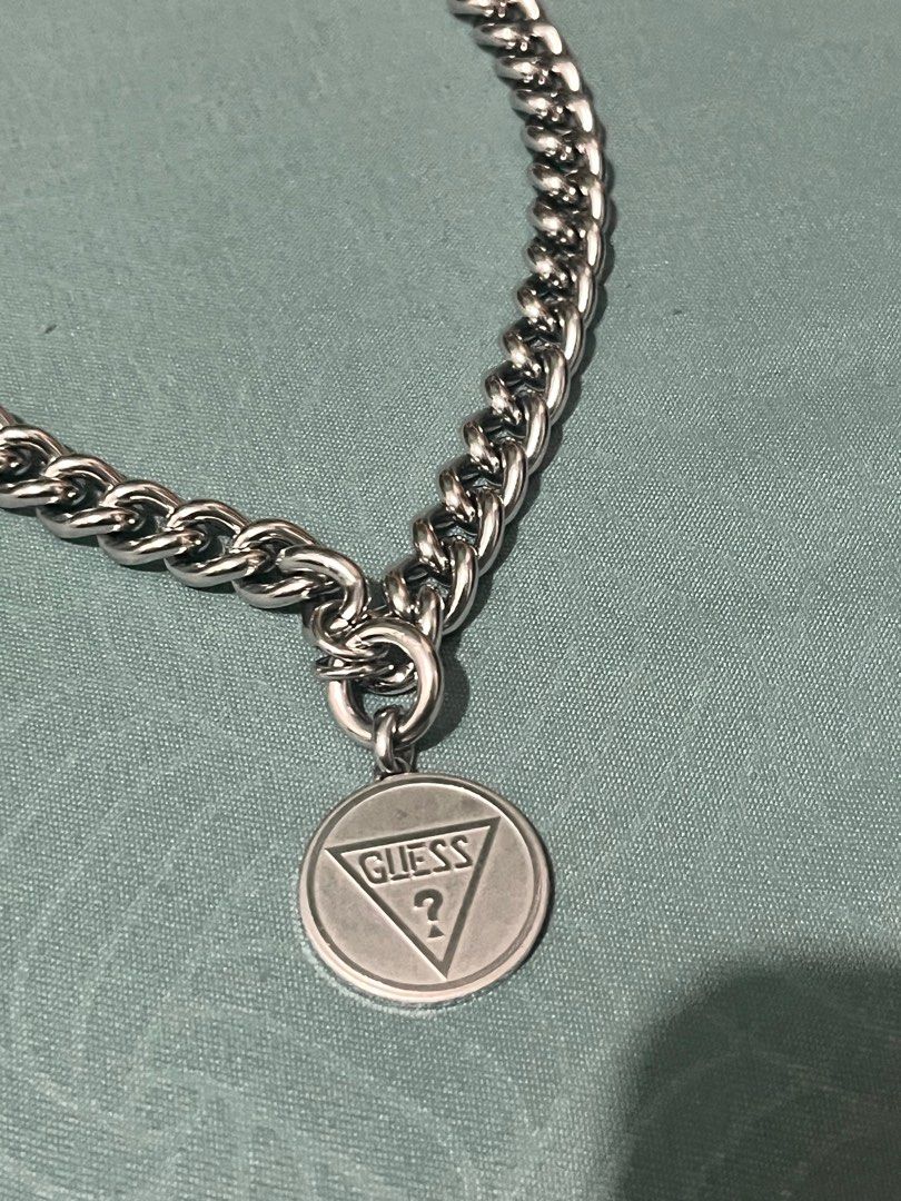 GUESS Silver Vintage Bear Chain Necklace (Category: Necklaces) located in Muntinlupa City. Submitted by jnprvbcr (Listing ID 1388764636, Image 3). Description: - authentic GUESS necklace - good condition, no fading or tarnishing - comes with a pouch - has a weight to it - comes with a mini dust bag .