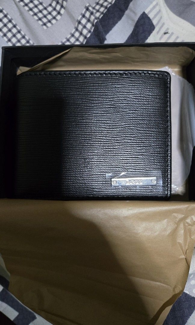 Hugo Boss Wallet (Category: Luxury Bags & Wallets) located in Quezon City. Submitted by dpd12 (Listing ID 1388723359, Image 3). Description: Brand New Hugo Boss Wallet Bought from USA last March 2025 for 150 usd Black leather wallet Authentic brand new Interested? PM.