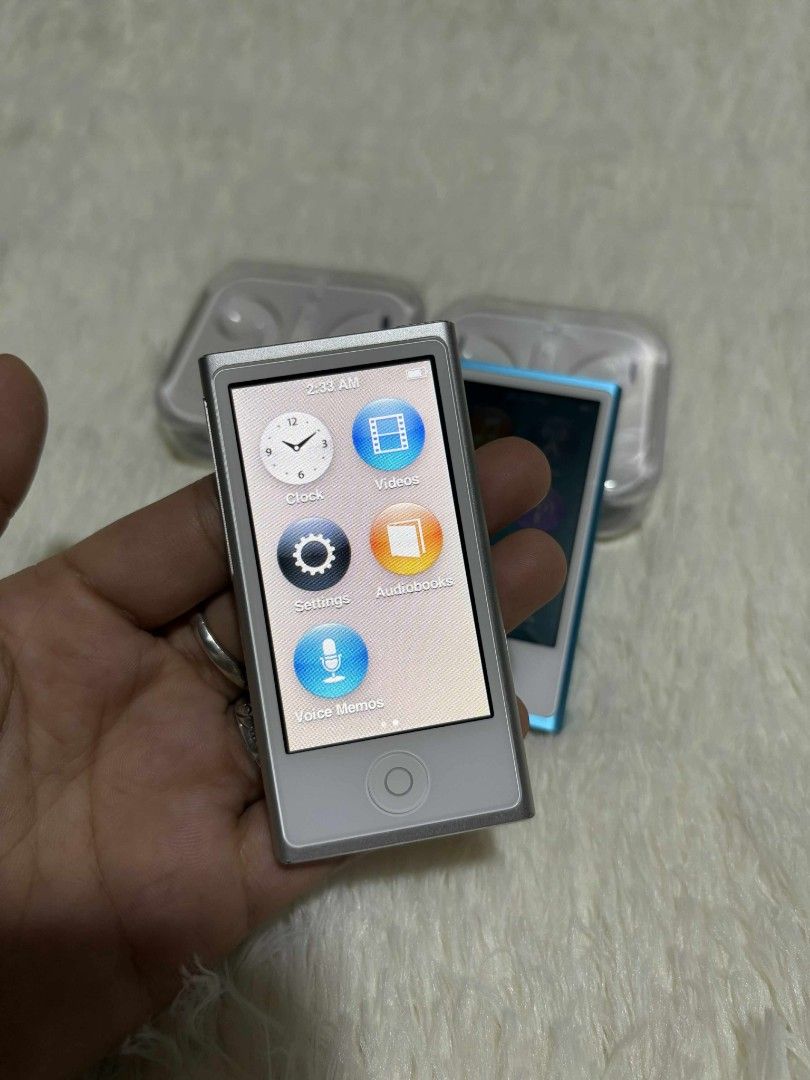 iPod Nano 7 Smooth Silver 16gb (Category: Portable Audio Accessories) located in Quezon City. Submitted by jkionaire17 (Listing ID 1388810087, Image 2). Description: 🎶✨ iPod Nano 7th Gen Silver – 90% Smooth! ✨🎶 A rare Apple classic for true music lovers 🍏 ✅ 1,000+ songs & music videos pre-installed 🎧🎥 ✅ 90% smooth overall condition 💎 ✅ Compact, stylish & collectible – perfect everyday music buddy 🎶 💵 Only ₱4,888 (compare on the Orange App
